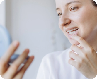 Photo of a woman looking in a mirror